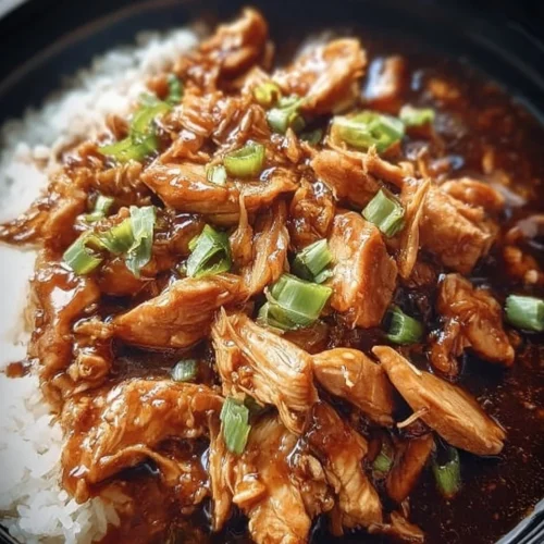 Delicious Bourbon Chicken served with a rich glaze and fresh vegetables