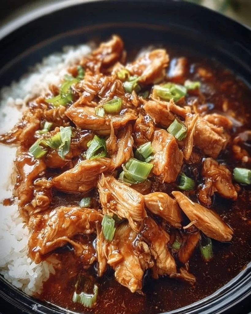 Delicious Bourbon Chicken served with a rich glaze and fresh vegetables