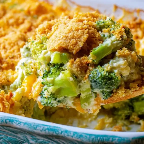 A bubbling broccoli casserole with a golden-brown crust fresh from the oven.