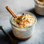 Delicious Carrot Cake Overnight Oats topped with nuts and spices