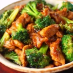 Delicious Chinese Chicken and Broccoli stir-fry in a colorful bowl