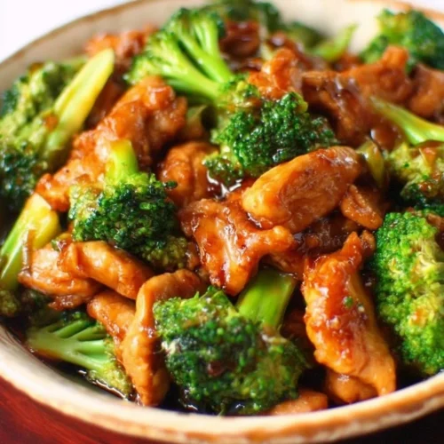 Delicious Chinese Chicken and Broccoli stir-fry in a colorful bowl