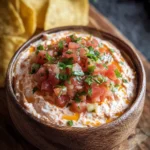 Cream Cheese Salsa Dip served in a bowl with tortilla chips