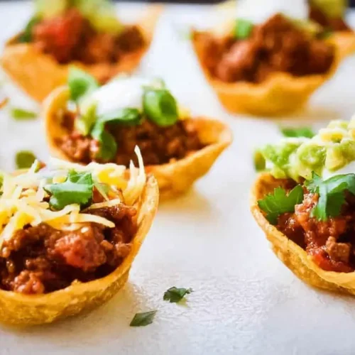 A vibrant spread of delicious meat appetizers on a serving tray.