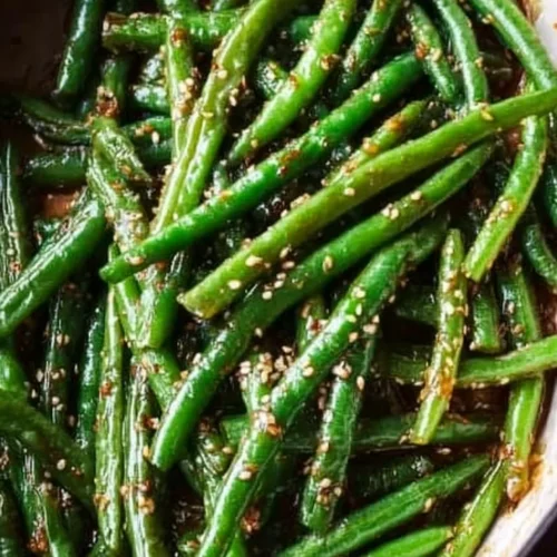 Miso green beans served in a bowl, garnished and ready to enjoy.
